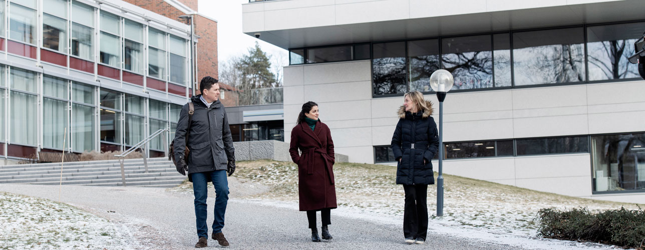 Colleagues walking outside DNV head office 