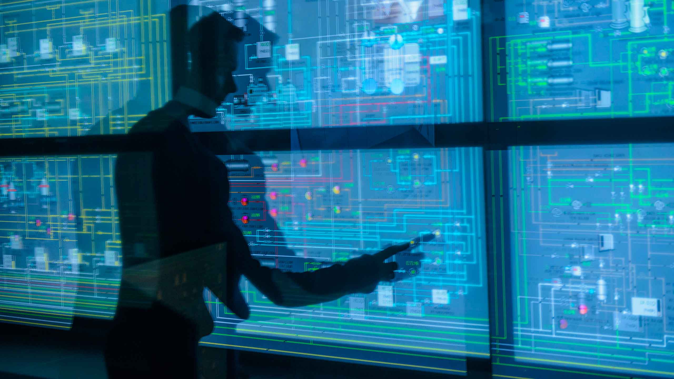 Man examining digital infrastructure of a ship